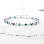 Bransoleta srebrna z zielonymi cyrkoniami - obrazek 3