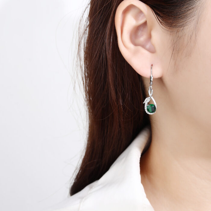 Kolczyki srebrne wiszące listki cyrkonie szmaragdowe - obrazek 3