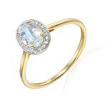 Pierścionek złoty z białym topazem i diamentami