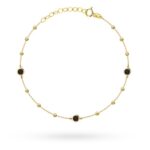 Bransoletka złota kuleczki i czarne kamienie