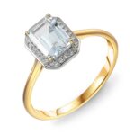 Pierścionek złoty z białym topazem i diamentami