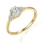 Pierścionek złoty z białym topazem i diamentami