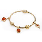 Zawieszka złota do bransoletki charms z koralem - obrazek 2